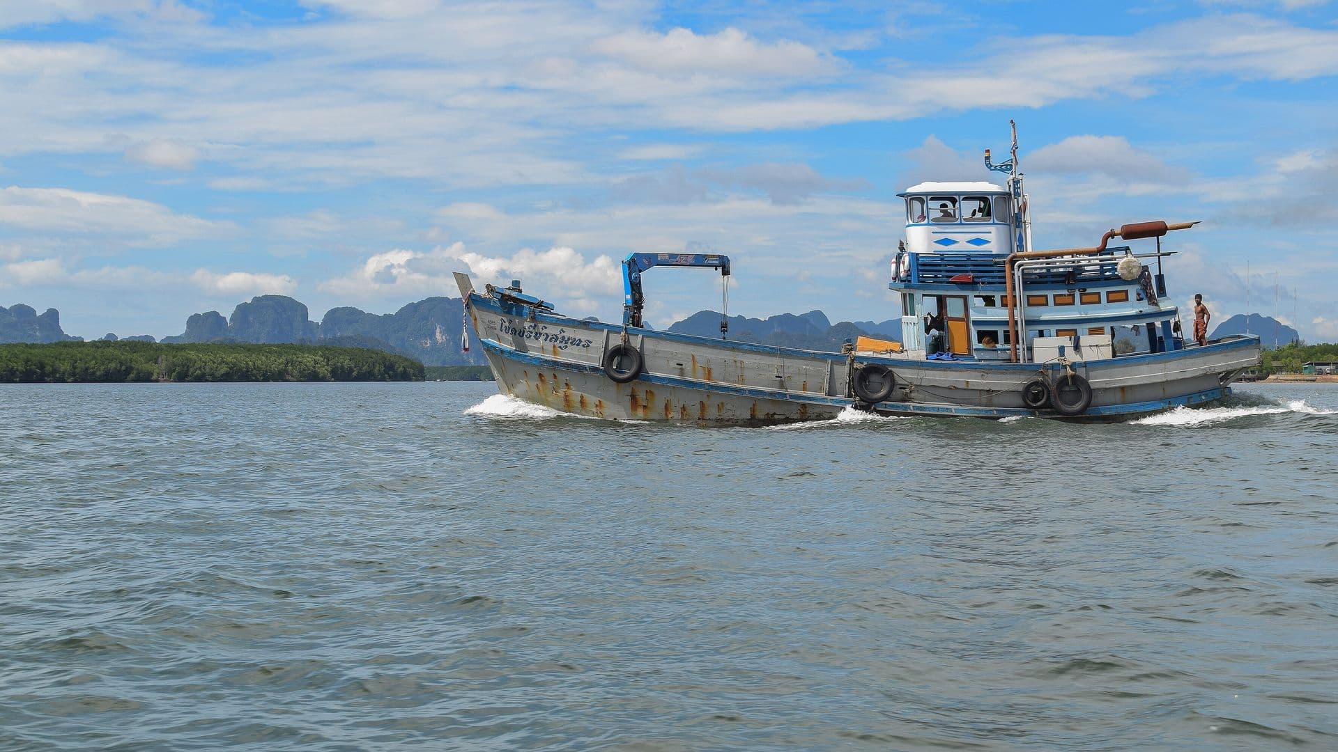 Boat cruising in Phang Nga Bay near Phuket, Thailand
