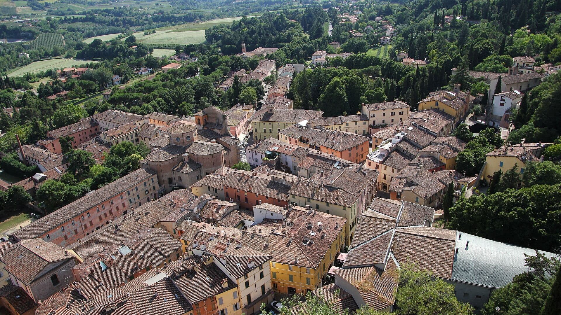 Panorama of Brisighella with its fortress and clock tower in the hills above Faenza