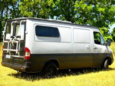 Rear three-quarter view of The A Van with bike rack