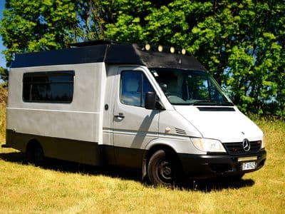Mercedes-Benz Sprinter campervan GI Joe front three-quarter view, no decals