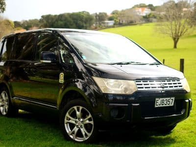 Mitsubishi Delica sleeper van Black Hawk, front three-quarter view