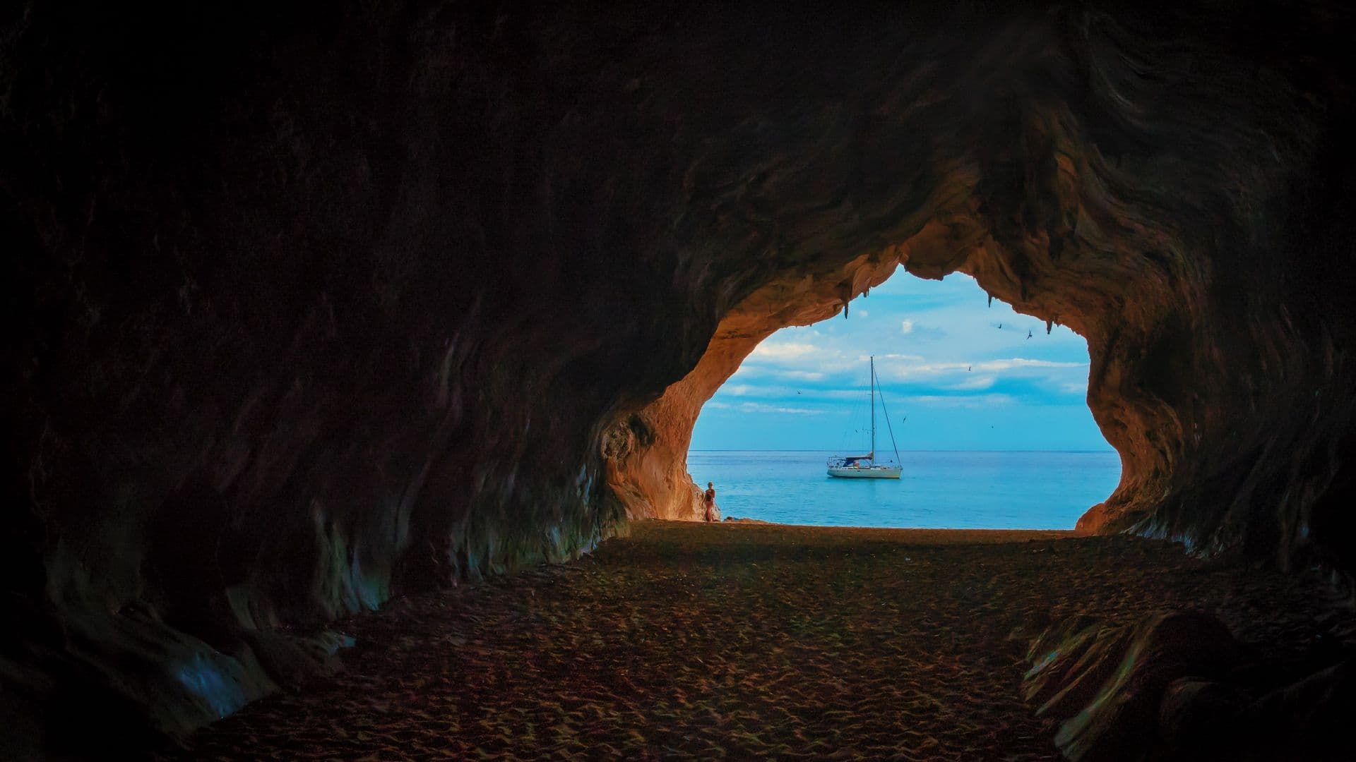 sea cave with boat