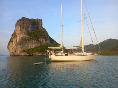 Geronimo anchored next to a rock island on a day trip