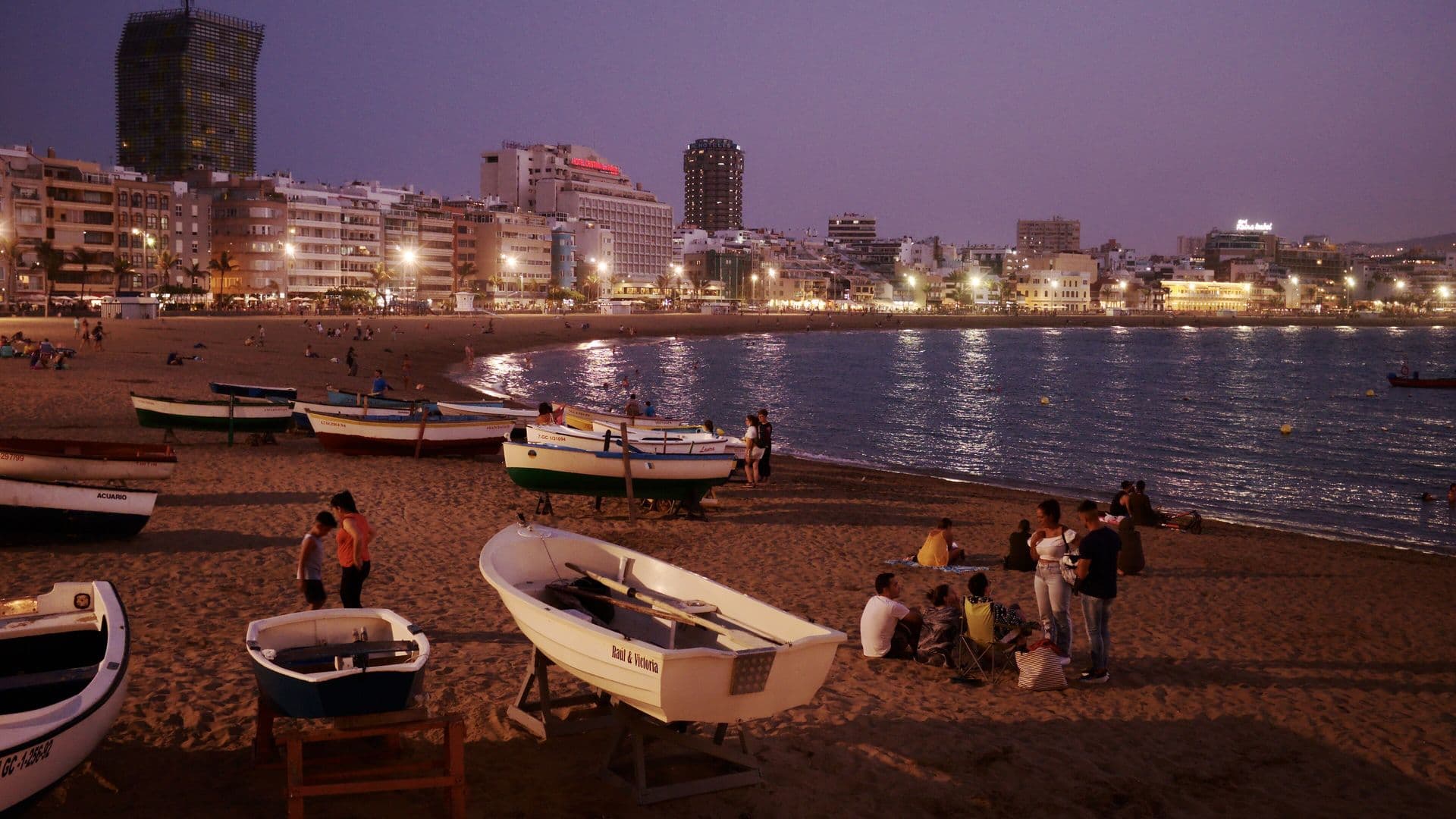 Fishing boats on Las Canteras beach in Las Palmas de Gran Canaria at dusk