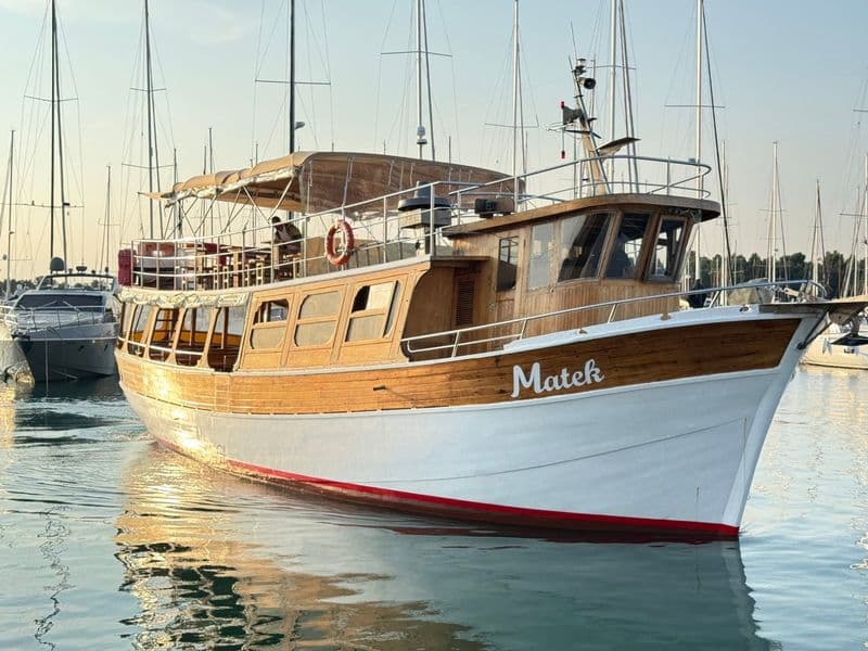 Matek boat in the marina at sunset