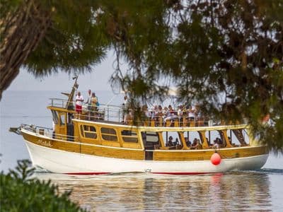 Matek boat docked at the Rovinj waterfront