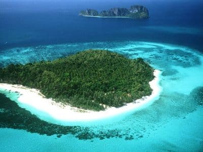 Island with white sand beach, aerial view