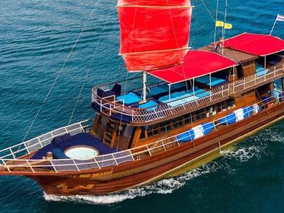 Red Dragon classic Thai yacht under sail off Koh Samui