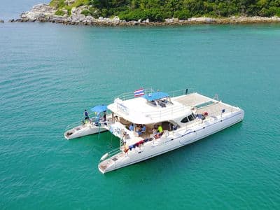 Emerald Gem catamaran covered deck and tables, Koh Samui