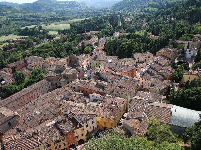 Panorama of Brisighella with its fortress and clock tower in the hills above Faenza