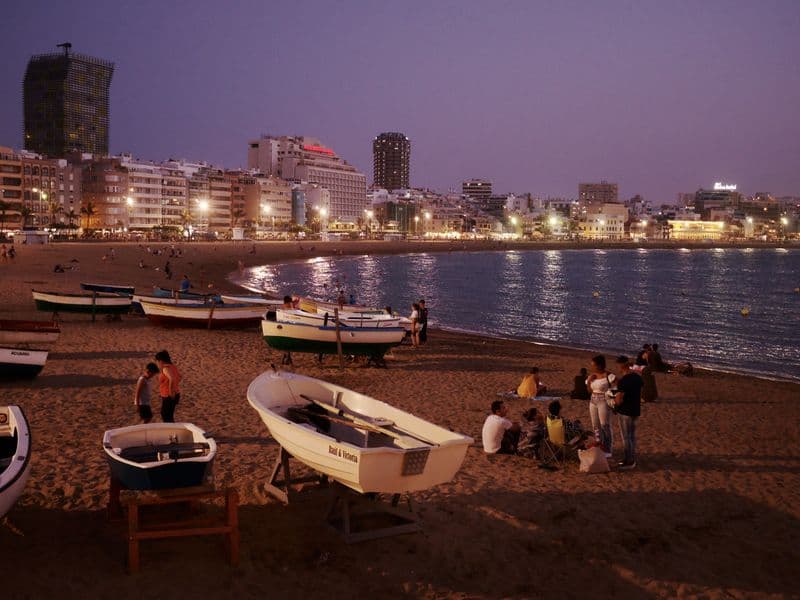 Fishing boats on Las Canteras beach in Las Palmas de Gran Canaria at dusk