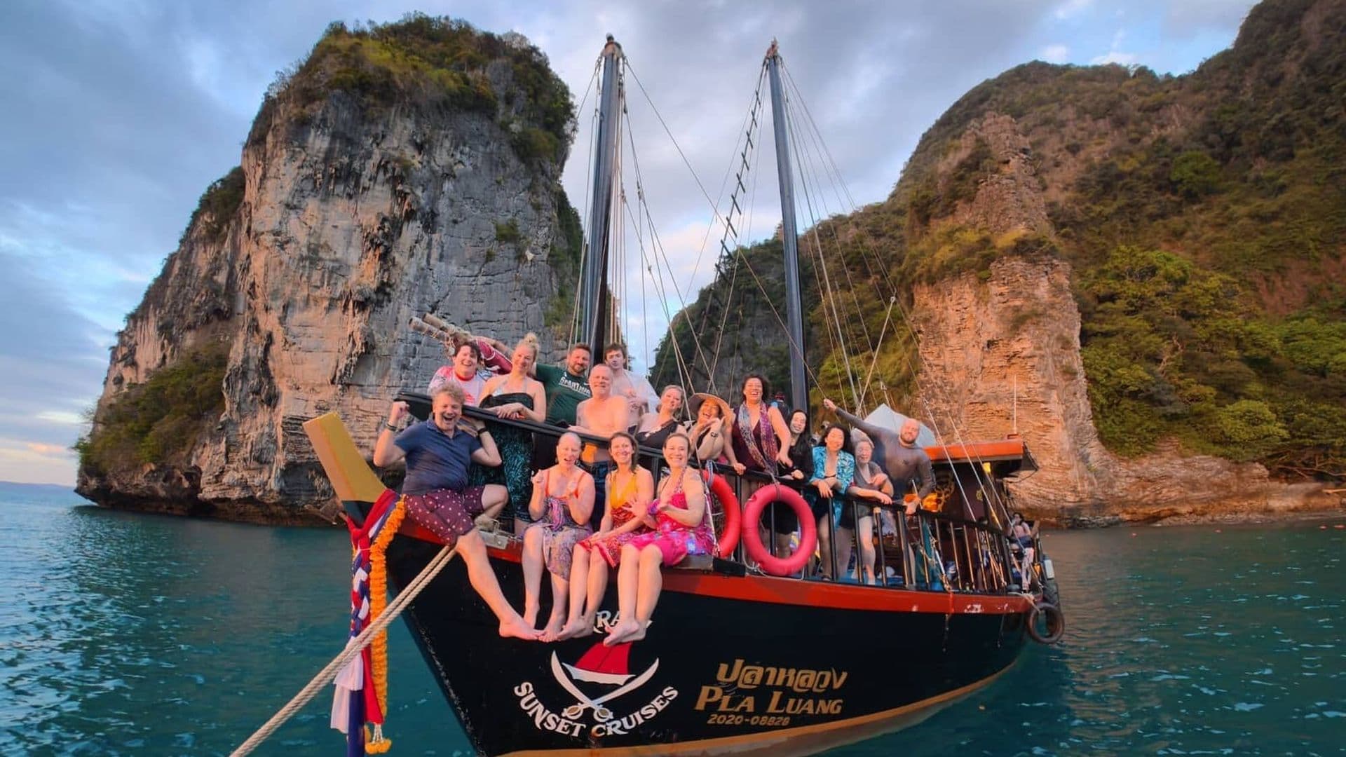 Traditional 100-year-old Siamese junk boat on turquoise water near Krabi